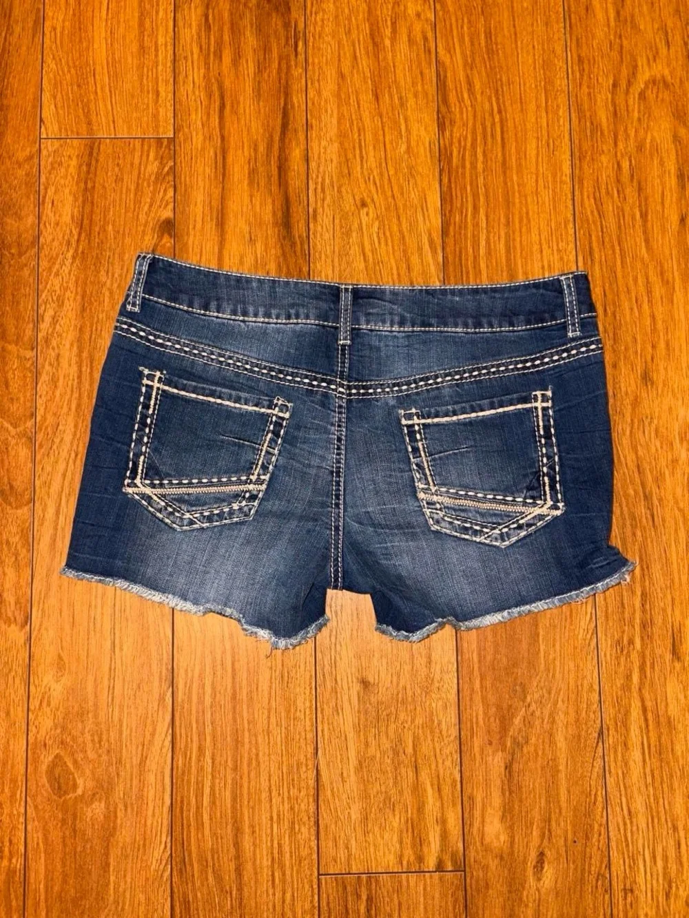 blue denim Y2K shorts with white stitching